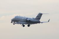 N815RA @ CID - Departing Ruway 13 just after sunrise with overcast sky, ISO 1600 - by Glenn E. Chatfield