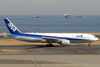 JA703A @ RJTT - ANA B777 arrives Haneda - by Terry Fletcher