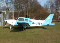 G-USSY @ EGHP - PARKED UP OUTSIDE THE WILTSHIRE AVIATION HANGER - by BIKE PILOT