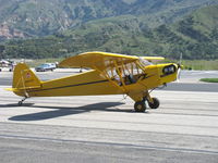 N98425 @ SZP - 1946 Piper J3C-65 CUB, Continental C90 90 Hp upgrade, taxi after landing Rwy 22 - by Doug Robertson