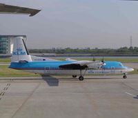 PH-KVK @ EGLC - Taken through glass from the departure lounge - by keith sowter