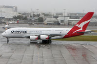 VH-OQB @ YSSY - Qantas A380 taxies to stand in unusually foul Sydney weather