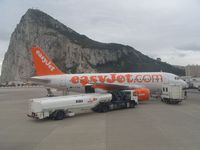 G-EZDK @ LXGB - Easy Jet - Airbus 319 and refueller - by David Burrell