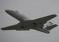 N550CZ @ DTN - Taking off from runway 32 at the Shreveport Downtown airport on a nasty overcast, windy day.