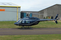 G-WIZZ @ EGBJ - Bell 206B at Gloucestershire Airport - by Terry Fletcher