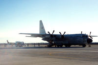 FAC1004 @ GKY - Colombian Air Force C-130 at Arlington - picking up N667GH - Huey 800 prototype