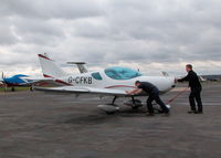 G-CFKB @ EGTF - MINUS PROP BEING PUSHED TO THE ALAN MANN HANGERS - by BIKE PILOT