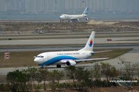 B-2897 @ VHHH - Donghai Airlines taxying to the end of runway 07R - by Michel Teiten ( www.mablehome.com )