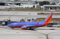N730SW @ KFLL - Boeing 737-700 - by Mark Pasqualino
