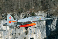 J-3093 @ LSMM - The mountains are not that far away at the Meiringen rwy 10 approach.