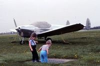 N94711 @ UGN - Scouting the airport prior to working a temporary tower.  Those are my kids, of course.