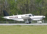 N4028W @ DTN - Starting to roll down runway 14 at the Shreveport Downtown airport. - by paulp