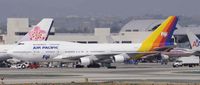 DQ-FJK @ KLAX - Taxi to gate - by Todd Royer