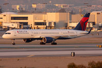 N723TW @ LAX - Delta Air Lines N723TW (FLT DAL81) exitting RWY 25L after arrival from John F Kennedy Int'l (KJFK) in early evening light. - by Dean Heald