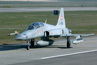 J-3210 @ LSMP - The F-5E is used as an ECM platform nowadays. The equip[ment can be seen underneath the wing and at the left wing tip. Bonus is the badge of EFlSt 24, that I had not seen on a Tiger before. - by Joop de Groot