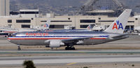N328AA @ KLAX - Taxi to gate - by Todd Royer