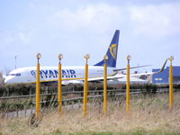 EI-DHF @ EGGP - Ryanair 737 taxing for a 27 departure - by Chris Hall