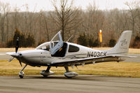N403CK @ SMQ - Cirrus parked in the transient area at Somerset - by Bruce Vinal