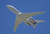 N120AK @ KSNA - Bombardier BD-700 climbing the blue skies - by Mike Khansa