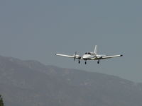 N975DA @ CCB - Brackett plane on final to visit Cable - by Helicopterfriend