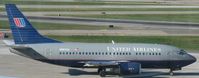 N907UA @ KMSP - Taxiing to active runway at MSP. - by Kreg Anderson