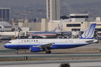 N465UA @ KLAX - Taxi to gate - by Todd Royer
