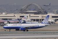N469UA @ KLAX - Taxi to gate - by Todd Royer