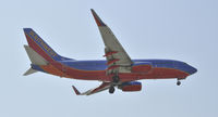 N718SW @ KLAX - Landing 24R at LAX - by Todd Royer