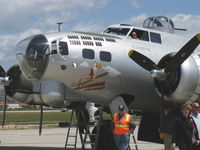 N5017N @ CMA - 1944 Boeing B-17G FLYING FORTRESS 'Aluminum Overcast' of the EAA, four Wright Cyclone R-1820-97 9 cylinder 1,200 Hp radials, Limited class, nose art - by Doug Robertson