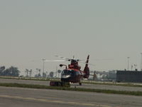 6590 @ POC - USCG Dolphin HH 65C taxiing to the northside transient parking - by Helicopterfriend