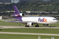 N368FE @ KSAT - decelerating its speed after touchdown