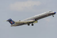 N702SK @ KSAT - CRJ climbs out