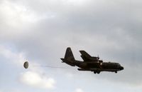 74-2061 @ MHZ - Tactical supply drop demonstration by this C-130H Hercules of 463 Tactical Air Wing at the 1980 RAF Mildenhall Air Fete. - by Peter Nicholson