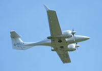 G-OCCY @ EGTC - Cabair Twin Star taking off at Cranfield. - by captainflynn