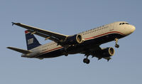 N102UW @ KLAX - Landing 24R at LAX - by Todd Royer