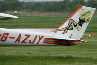 G-AZJY @ EGCB - Tail art on Cessna 150 at Manchester Barton - by Terry Fletcher