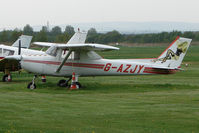 G-AZJY @ EGCB - Cessna 150 at Manchester Barton - by Terry Fletcher