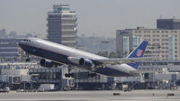 N675UA @ KLAX - Departing LAX on 25R - by Todd Royer
