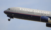 N675UA @ KLAX - Departing LAX on 25R - by Todd Royer