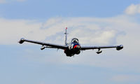 N4229 @ KBKD - A screaming 350 mph low pass with the Pinto, and me below. The ears were gone for about 7 minutes - by John Little