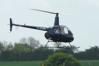 G-HURN @ EGBK - Robinson R22 At Sywell in May 2009 - by Terry Fletcher