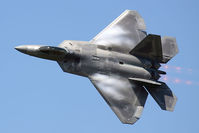 05-4094 @ LFI - Major Dave Zeke Skalicky, the USAF F-22A Raptor Demonstration Team Commander and Pilot based here at Langley AFB, making a nice pass during Friday's practice show at Airpower Over Hampton Roads 2009. - by Dean Heald