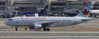 C-FDRP @ KLAX - Taxi to gate - by Todd Royer
