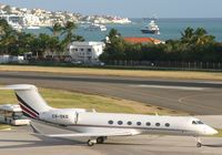 CS-DKD @ TNCM - taxing runway 10