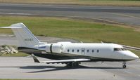 N831ET @ TNCM - taxing runway 10 - by daniel jef