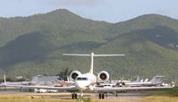 N90AM @ TNCM - taxing runway 10