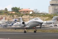 N55UJ @ TNCM - taking off