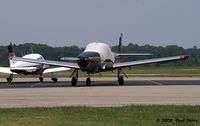 N5277K @ PVG - Standing out amongst the other birds - by Paul Perry