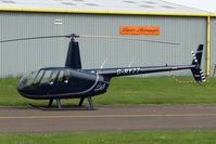 G-RYZZ @ EGBJ - Robinson R44 At Staverton in May 2009 - by Terry Fletcher
