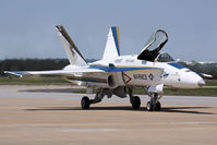 164630 @ LFI - USMC McDonnell Douglas F/A-18C Hornet Demo aircraft 164630 from VFA-106 Gladiators taxiing back to park after a spectacular performance. - by Dean Heald